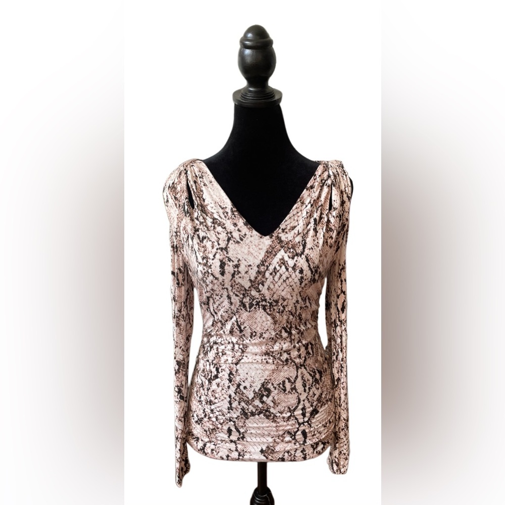 Jennifer Lopez: Brown and White Animal Print Cold Shoulder Blouse
